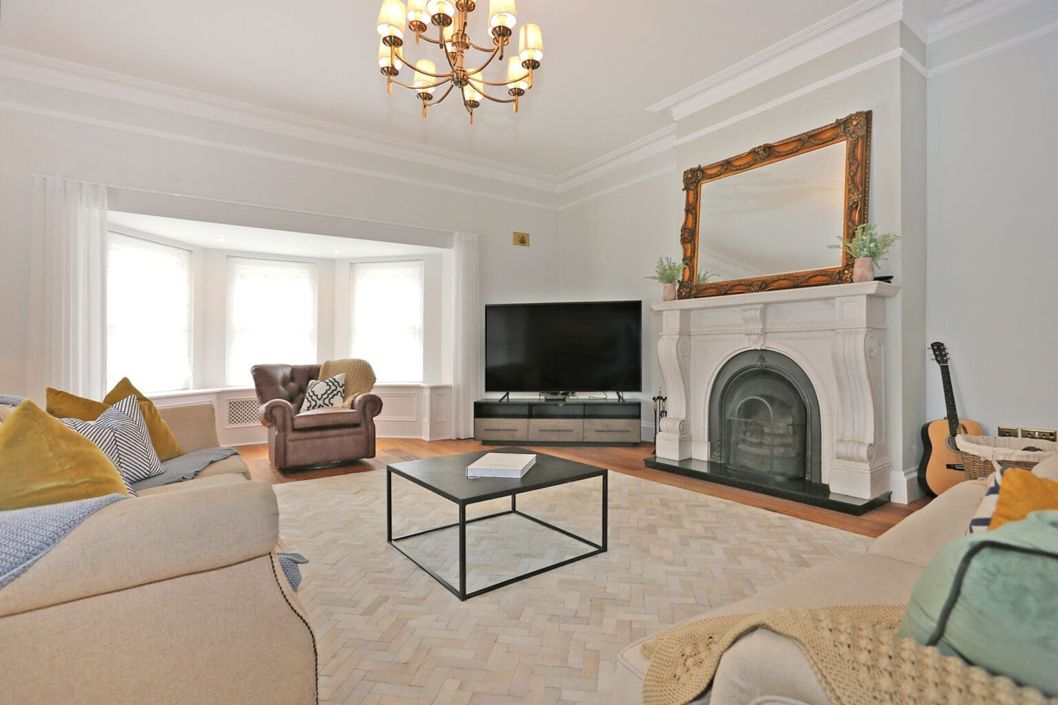 Elegant lounge with fireplace at Sallymount House