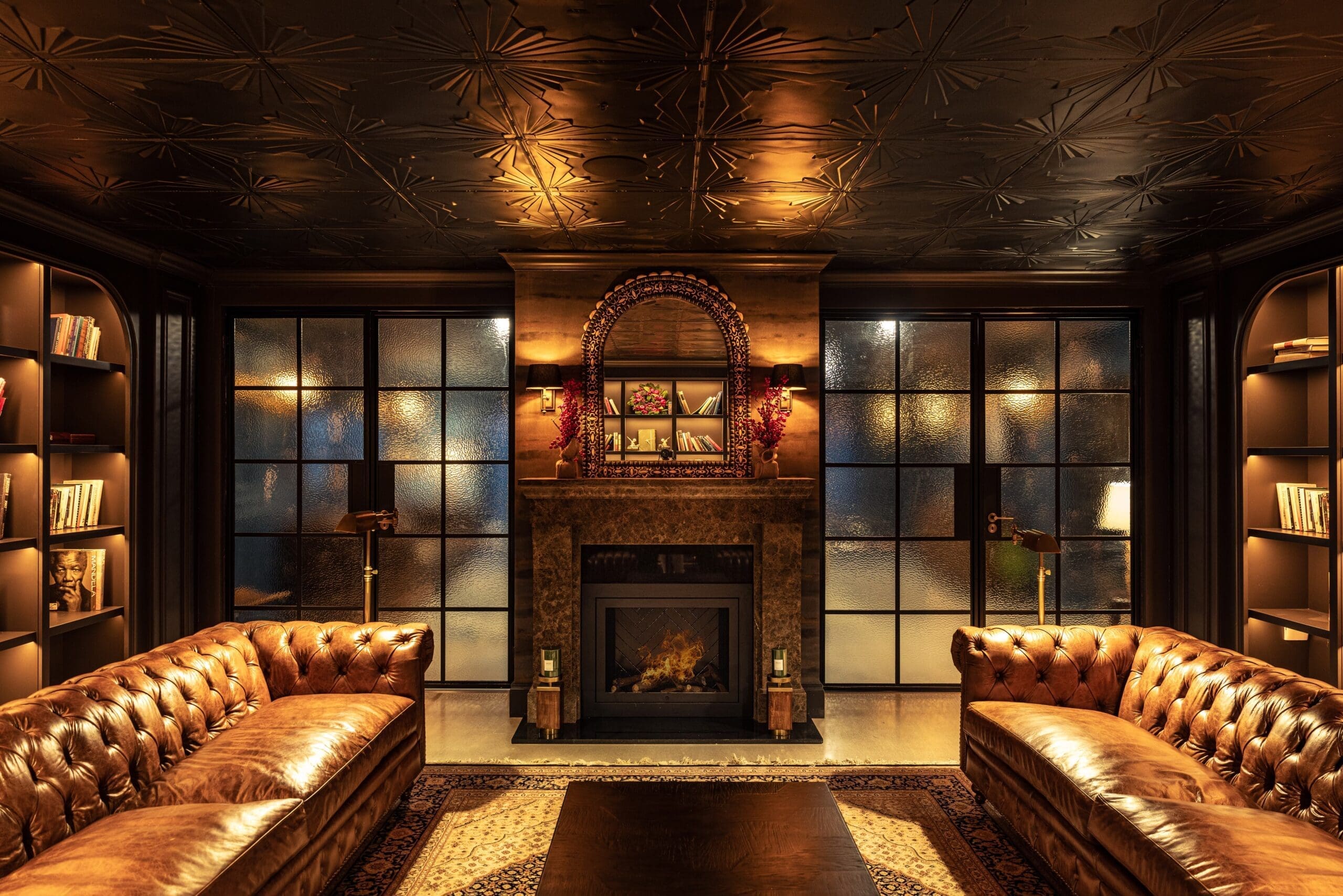 Elegant lounge with fireplace at Sallymount House