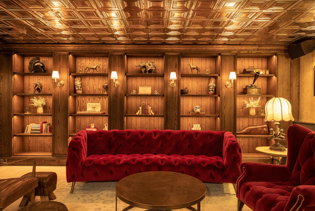 Red velvet library lounge at Sallymount House